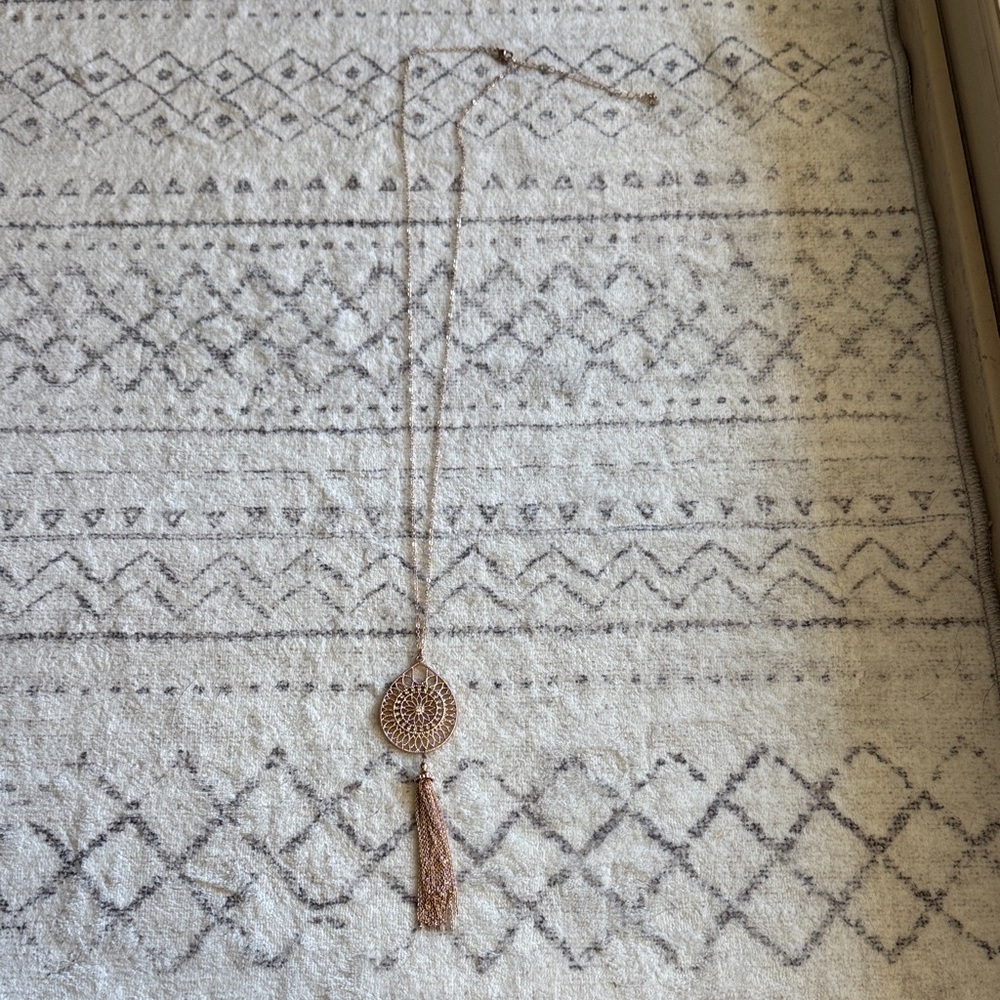 Elegant Gold Pendant Necklace with Tassel